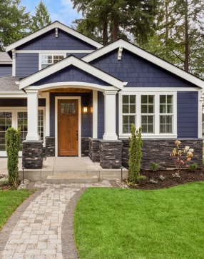 Blue House with Shingles Roof