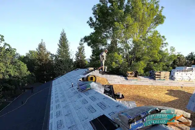 Norcal-Roofing's worker on a roof